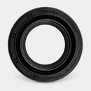 One black rear-inner wheel seal with circular opening and molded sealing lips