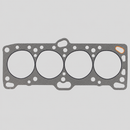 Single four-cylinder head gasket with exact bore and coolant passage pattern