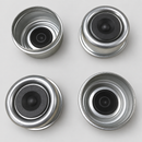 Four Dexter EZ Lube trailer hub dust caps — complete set